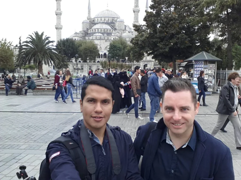 Cruising with Danny and Peter, Holland America Line, Ryndam, Istanbul, Turkey | A scenic view of the m/s Ryndam during our Mediterranean cruise adventure in Istanbul, showcasing the iconic Ayasofya (Hagia Sophia) and the magnificent Blue Mosque, with vibrant street life in Sultanahmet Square, highlighting the cultural richness of our luxury cruise experience.