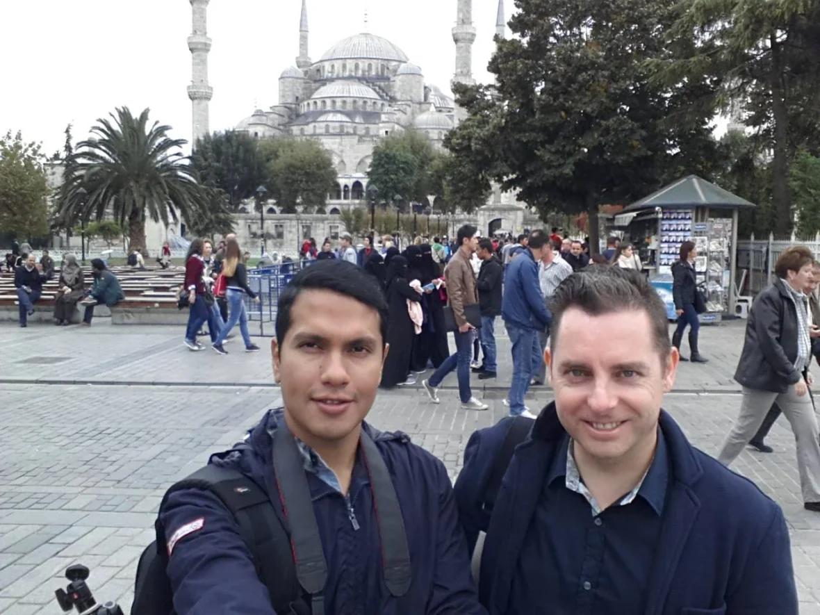 Cruising with Danny and Peter, Holland America Line, Ryndam, Istanbul, Turkey | A scenic view of the m/s Ryndam during our Mediterranean cruise adventure in Istanbul, showcasing the iconic Ayasofya (Hagia Sophia) and the magnificent Blue Mosque, with vibrant street life in Sultanahmet Square, highlighting the cultural richness of our luxury cruise experience.