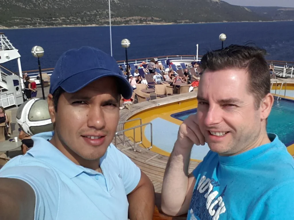 Discovering the Dardanelles: A Comprehensive Guide to Our Holland America Line Dardanelles Cruise Experience 3 Cruising with Danny and Peter, Holland America Line, Ryndam, Turkey, Cruising The Dardanelles | Guests enjoying a Dardanelles cruise experience on Holland America Line's Ryndam, featuring stunning views of the Dardanelles Strait, luxurious onboard dining options with cocktails, and engaging activities during a relaxing day at sea.