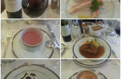 Cruising with Danny and Peter, Holland America Line, Ryndam, Thessaloniki, Greece | A picturesque view of Thessaloniki's waterfront, showcasing iconic historical sites, including the White Tower and the Arch of Galerius, complemented by a luxurious dining experience on the MS Ryndam featuring exquisite dishes like beef Wellington and crab legs.