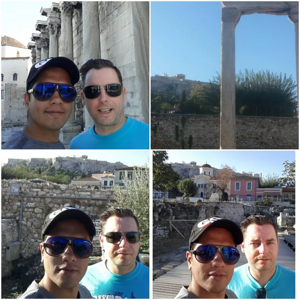 Cruising with Danny and Peter, Holland America Line, Ryndam, Piraeus, Athens, Greece | A picturesque view of our Greek breakfast experience featuring traditional local delicacies, such as creamy feta, olives, and fresh tomatoes, with the stunning Acropolis view in the background, showcasing the beauty of Mediterranean breakfast culture.