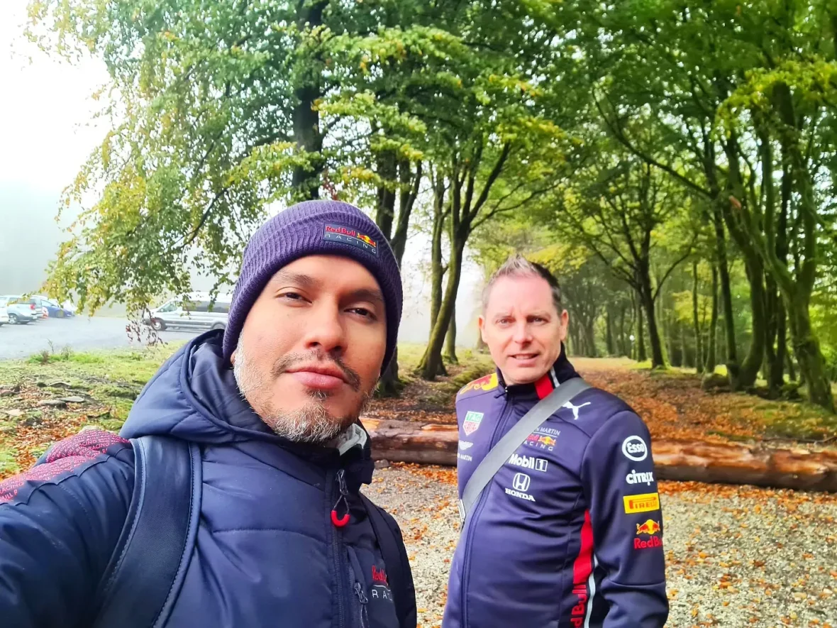 Cruising with Danny and Peter, Holland America Line, Rotterdam, Plymouth, England, Great Britain, United Kingdom | A foggy day in Plymouth Dartmoor showcases an eerie scene of historic churches and spooky graveyards, highlighting the enchanting beauty of Plymouth UK travel. A winding hiking trail through Dartmoor National Park is visible, surrounded by lush greenery and misty landscapes.