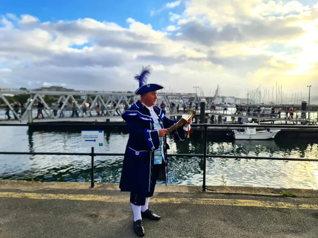 Cruising with Danny and Peter, Holland America Line, Rotterdam, Plymouth, England, Great Britain, United Kingdom | A foggy day in Plymouth Dartmoor showcases an eerie scene of historic churches and spooky graveyards, highlighting the enchanting beauty of Plymouth UK travel. A winding hiking trail through Dartmoor National Park is visible, surrounded by lush greenery and misty landscapes.