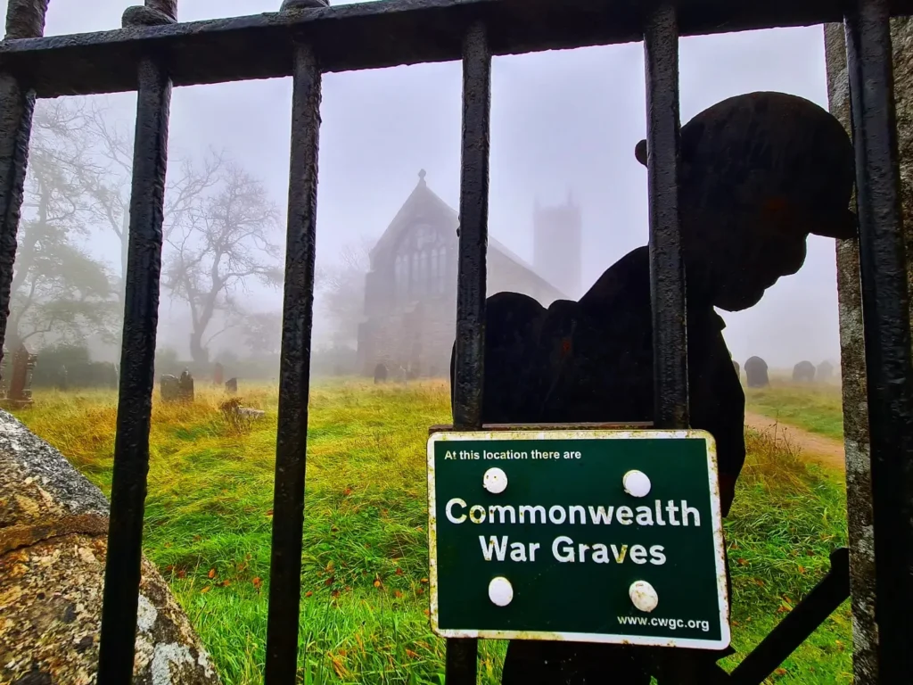Cruising with Danny and Peter, Holland America Line, Rotterdam, Plymouth, England, Great Britain, United Kingdom | A foggy day in Plymouth Dartmoor showcases an eerie scene of historic churches and spooky graveyards, highlighting the enchanting beauty of Plymouth UK travel. A winding hiking trail through Dartmoor National Park is visible, surrounded by lush greenery and misty landscapes.
