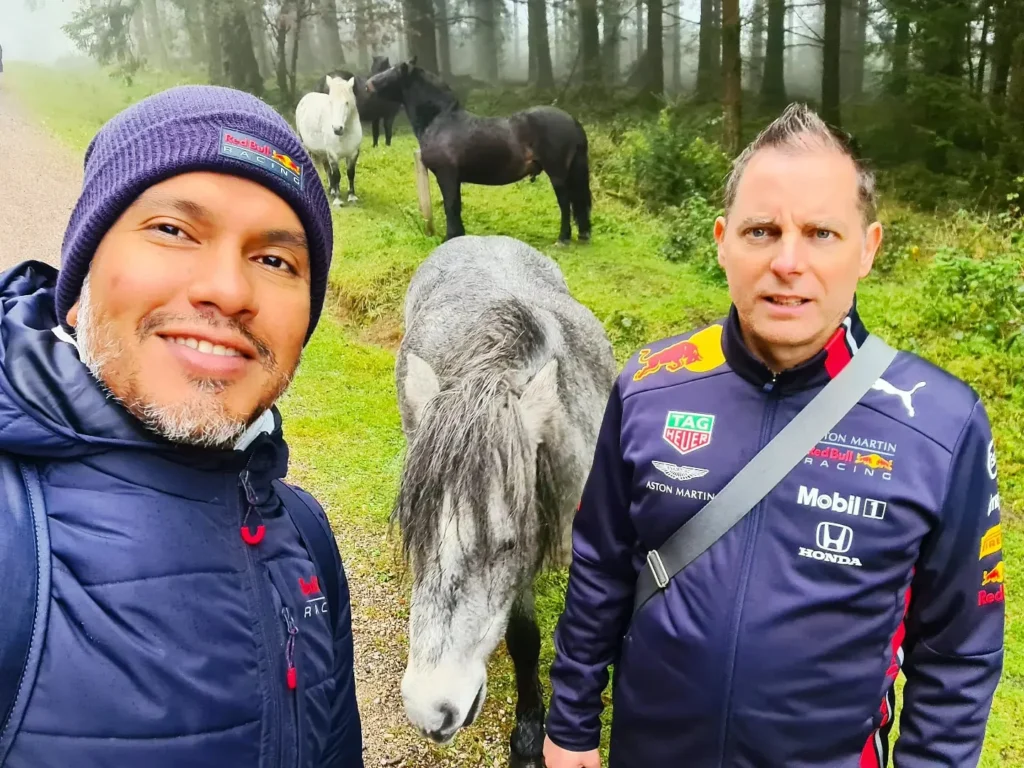 Cruising with Danny and Peter, Holland America Line, Rotterdam, Plymouth, England, Great Britain, United Kingdom | A foggy day in Plymouth Dartmoor showcases an eerie scene of historic churches and spooky graveyards, highlighting the enchanting beauty of Plymouth UK travel. A winding hiking trail through Dartmoor National Park is visible, surrounded by lush greenery and misty landscapes.