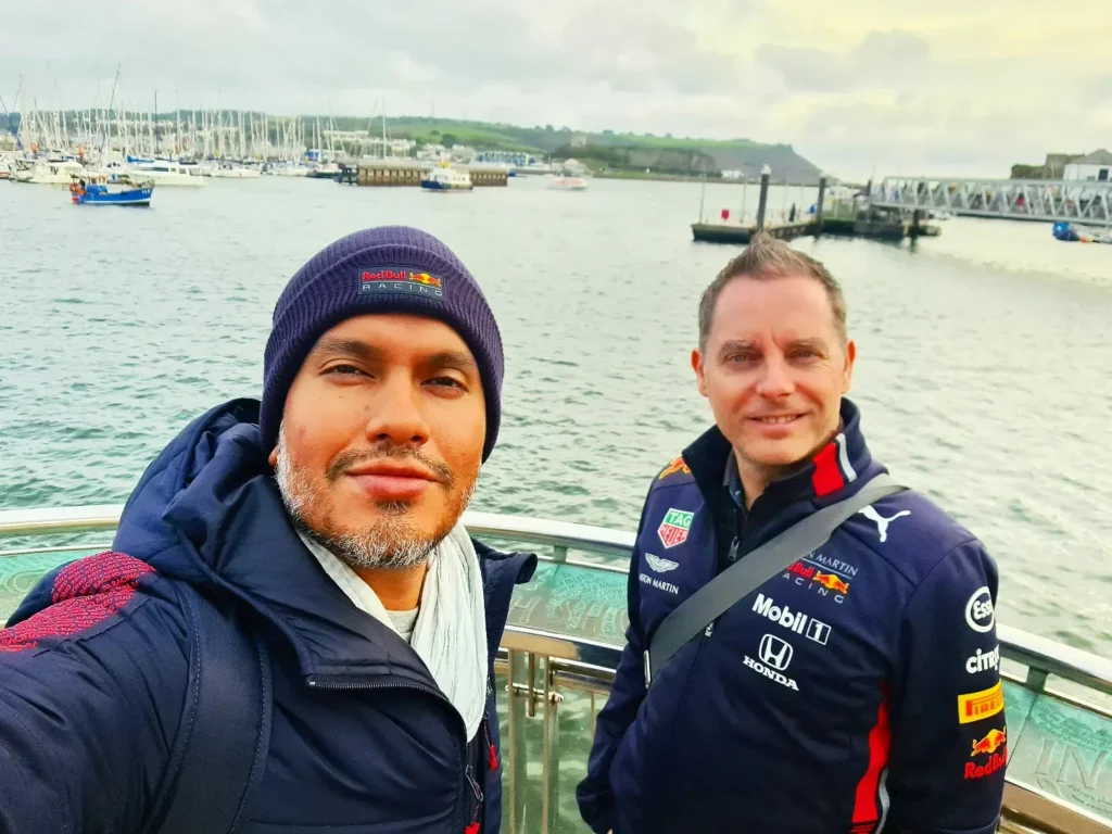 Cruising with Danny and Peter, Holland America Line, Rotterdam, Plymouth, England, Great Britain, United Kingdom | A foggy day in Plymouth Dartmoor showcases an eerie scene of historic churches and spooky graveyards, highlighting the enchanting beauty of Plymouth UK travel. A winding hiking trail through Dartmoor National Park is visible, surrounded by lush greenery and misty landscapes.