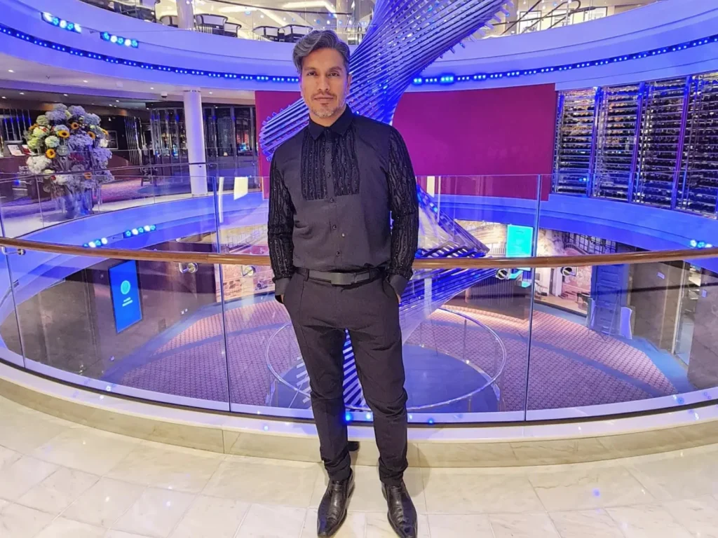 Cruising with Danny and Peter, Holland America Line, Rotterdam, Atlantic Ocean, Sea Day | Guests enjoying the first sea day on the Holland America Line 150th Anniversary Cruise aboard the Rotterdam, featuring scenic Atlantic Ocean views, elegant dining at the Pinnacle Grill, onboard events like the Mariners Society meeting on the Lido Deck, and morning breakfast selections. A memorable day at sea during Holland America Line’s milestone voyage celebration.