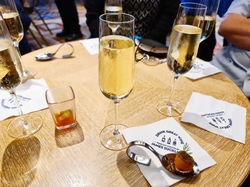 Cruising with Danny and Peter, Holland America Line, Rotterdam, Atlantic Ocean, Sea Day | Guests enjoying the first sea day on the Holland America Line 150th Anniversary Cruise aboard the Rotterdam, featuring scenic Atlantic Ocean views, elegant dining at the Pinnacle Grill, onboard events like the Mariners Society meeting on the Lido Deck, and morning breakfast selections. A memorable day at sea during Holland America Line’s milestone voyage celebration.