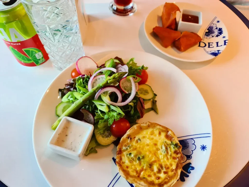 Cruising with Danny and Peter, Holland America Line, Rotterdam, Atlantic Ocean, Sea Day | Exquisite Pinnacle Grill dinner aboard Rotterdam Holland America, featuring gourmet cuisine like crab cakes, filet mignon, halibut, key lime pie, and luxury cruise dining experience at the Pinnacle Grill Holland America.