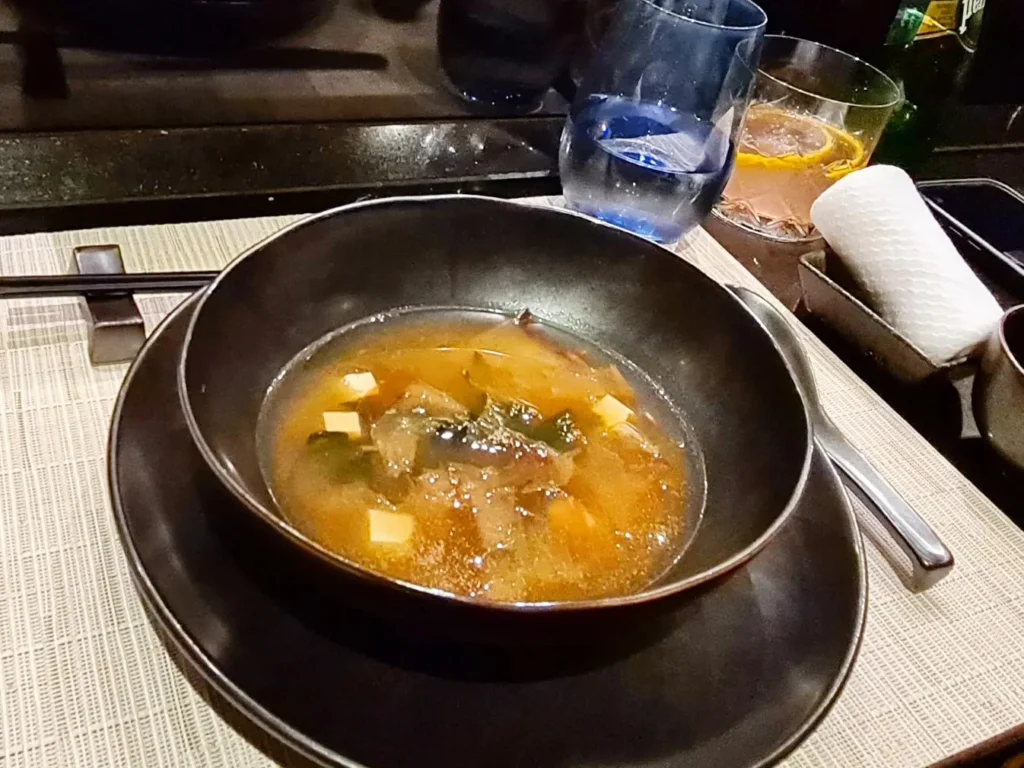 Cruising with Danny and Peter, Holland America Line, Rotterdam, Atlantic Ocean, Sea Day | A luxurious Sushi night MS Rotterdam experience aboard Holland America Line, featuring a variety of fresh sushi dishes like Hamachi, scallop ceviche, seared albacore tuna, and fried soft shell crab sushi, accompanied by cocktails at the Oceanview sushi restaurant with stunning ocean views, showcasing the Best sushi at sea during a memorable Sushi dining aboard MS Rotterdam.