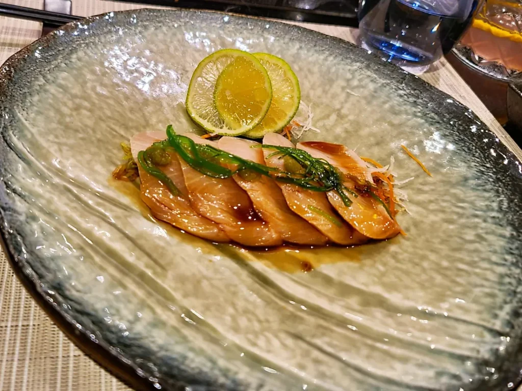 Cruising with Danny and Peter, Holland America Line, Rotterdam, Atlantic Ocean, Sea Day | A luxurious Sushi night MS Rotterdam experience aboard Holland America Line, featuring a variety of fresh sushi dishes like Hamachi, scallop ceviche, seared albacore tuna, and fried soft shell crab sushi, accompanied by cocktails at the Oceanview sushi restaurant with stunning ocean views, showcasing the Best sushi at sea during a memorable Sushi dining aboard MS Rotterdam.