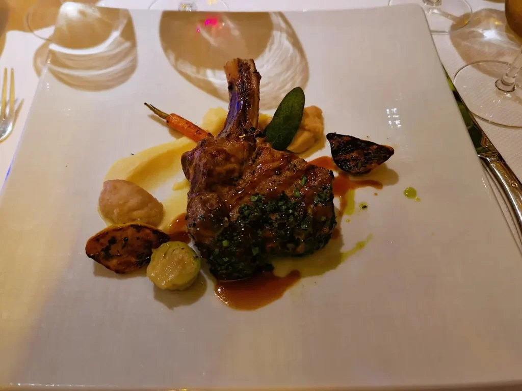 Cruising with Danny and Peter, Holland America Line, Rotterdam, Atlantic Ocean, Sea Day | Guests enjoying the exclusive Cellar Master Dinner aboard Holland America, featuring gourmet dishes, wine pairings, and an unforgettable luxury cruise dining experience.