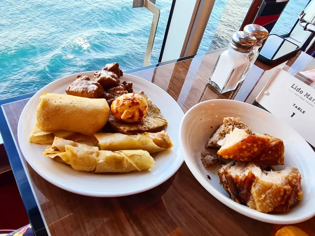 Cruising with Danny and Peter, Holland America Line, Rotterdam, Atlantic Ocean, Sea Day | Guests enjoying the exclusive Cellar Master Dinner aboard Holland America, featuring gourmet dishes, wine pairings, and an unforgettable luxury cruise dining experience.