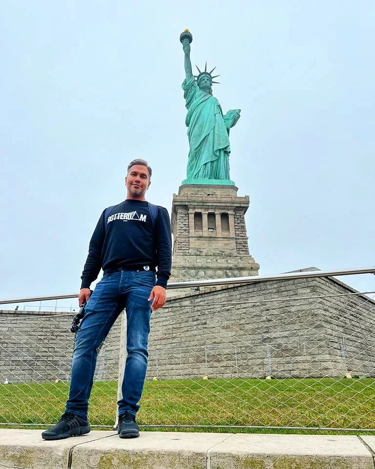 Cruising with Danny and Peter, Holland America Line, Rotterdam, New York, United States | Holland America NYC Cruise 150th Anniversary Celebration, exploring iconic landmarks like the Statue of Liberty and Ellis Island, onboard festivities at World Stage on MS Rotterdam.