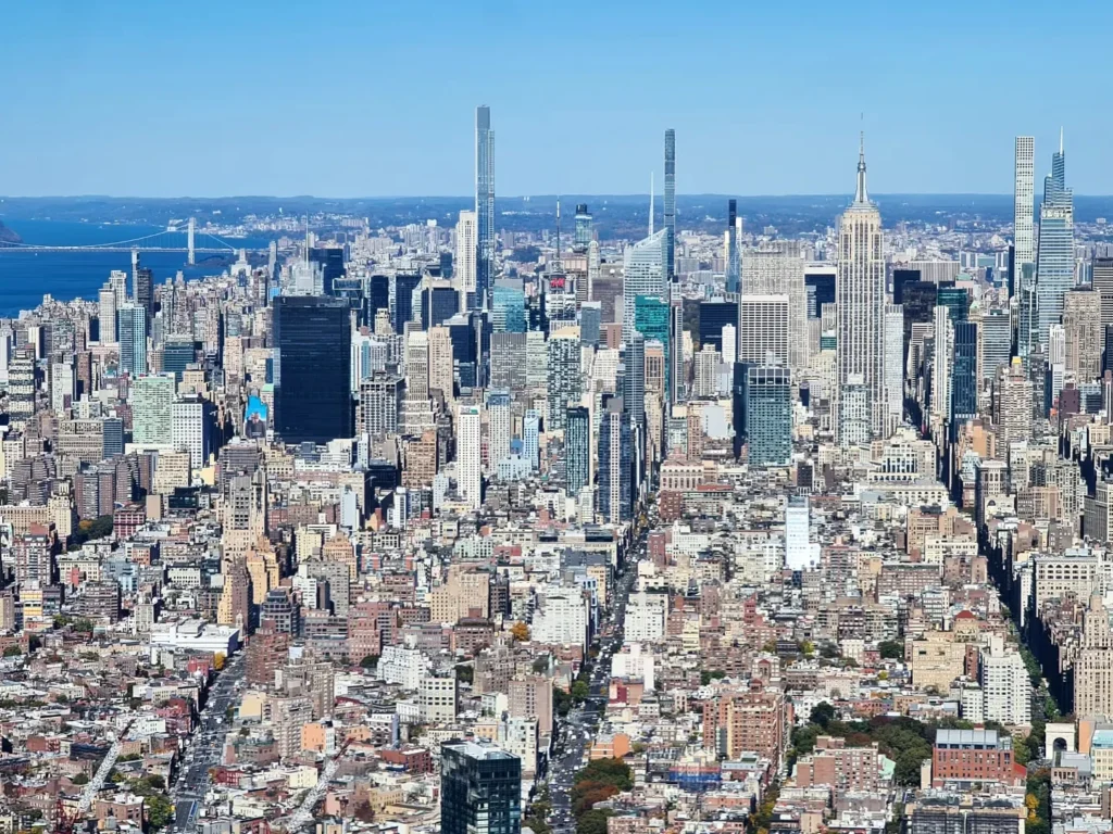 Cruising with Danny and Peter, Holland America Line, Rotterdam, New York, United States | Stunning views of the Brooklyn Bridge and Manhattan skyline during a New York City adventure, exploring iconic NYC bridges and 9/11 Memorial with panoramic views from the One World Observatory, capturing the vibrant energy of Times Square attractions and the historic NYC Financial District tour.