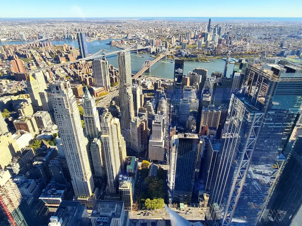 Cruising with Danny and Peter, Holland America Line, Rotterdam, New York, United States | Stunning views of the Brooklyn Bridge and Manhattan skyline during a New York City adventure, exploring iconic NYC bridges and 9/11 Memorial with panoramic views from the One World Observatory, capturing the vibrant energy of Times Square attractions and the historic NYC Financial District tour.