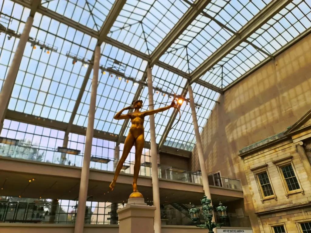 Cruising with Danny and Peter, Holland America Line, Rotterdam, New York, United States | Exploring Central Park New York on a sunny day, with scenic views of iconic landmarks like Bethesda Terrace and Bow Bridge, followed by a cultural visit to The Metropolitan Museum of Art showcasing masterpieces from Rembrandt, Van Gogh, and more.