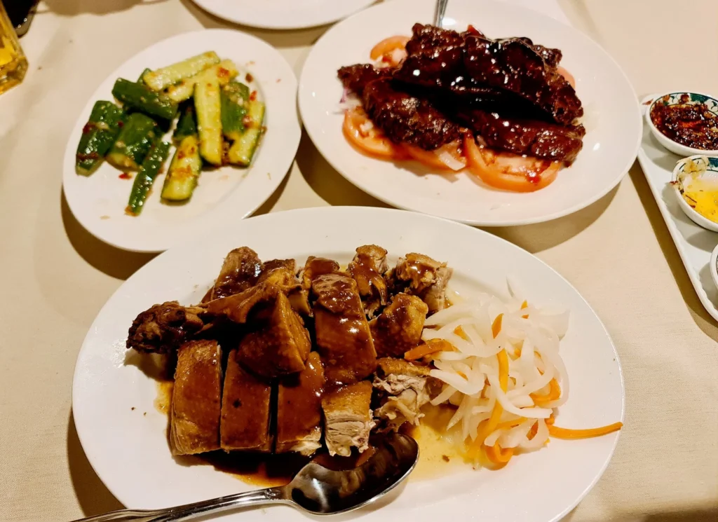 Cruising with Danny and Peter, Holland America Line, Rotterdam, New York, United States | Exploring Central Park New York on a sunny day, with scenic views of iconic landmarks like Bethesda Terrace and Bow Bridge, followed by a cultural visit to The Metropolitan Museum of Art showcasing masterpieces from Rembrandt, Van Gogh, and more.