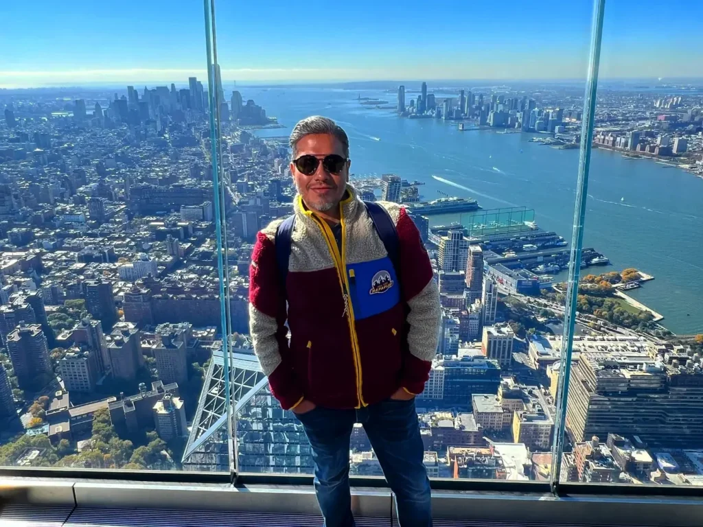 Cruising with Danny and Peter, Holland America Line, Rotterdam, New York, United States | New York Broadway experience with front row seats at Chicago on Broadway, featuring Angelica Ross as Roxie, stunning views from The Edge observation deck NYC, the iconic Hudson Yards Vessel, and a scenic stroll through High Line and Little Island. The vibrant Times Square at night and a delicious Chelsea Market food tour complete this unforgettable adventure.