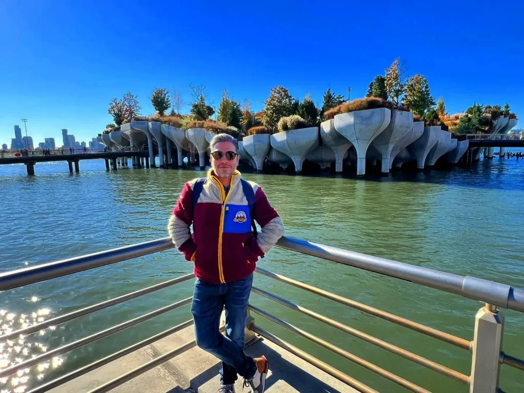 Cruising with Danny and Peter, Holland America Line, Rotterdam, New York, United States | New York Broadway experience with front row seats at Chicago on Broadway, featuring Angelica Ross as Roxie, stunning views from The Edge observation deck NYC, the iconic Hudson Yards Vessel, and a scenic stroll through High Line and Little Island. The vibrant Times Square at night and a delicious Chelsea Market food tour complete this unforgettable adventure.