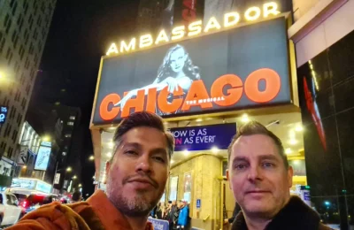 Cruising with Danny and Peter, Holland America Line, Rotterdam, New York, United States | New York Broadway experience with front row seats at Chicago on Broadway, featuring Angelica Ross as Roxie, stunning views from The Edge observation deck NYC, the iconic Hudson Yards Vessel, and a scenic stroll through High Line and Little Island. The vibrant Times Square at night and a delicious Chelsea Market food tour complete this unforgettable adventure.