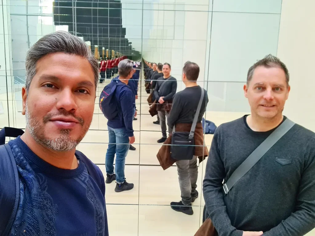 Cruising with Danny and Peter, Holland America Line, Rotterdam, New York, United States | View of iconic New York City landmarks including the Top of the Rock, Saint Patrick's Cathedral, MoMA, and the Flatiron Building, showcasing famous NYC art museums and historic monuments.