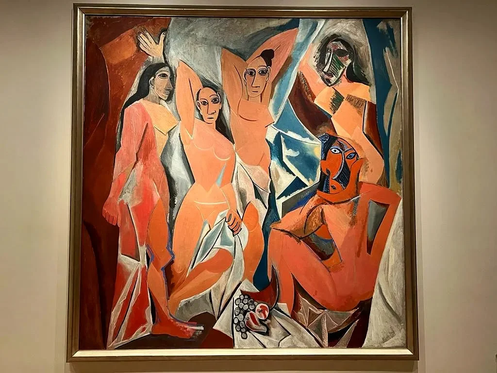 Cruising with Danny and Peter, Holland America Line, Rotterdam, New York, United States | View of iconic New York City landmarks including the Top of the Rock, Saint Patrick's Cathedral, MoMA, and the Flatiron Building, showcasing famous NYC art museums and historic monuments.