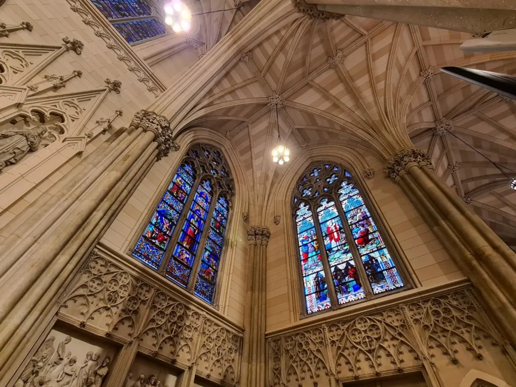 Cruising with Danny and Peter, Holland America Line, Rotterdam, New York, United States | View of iconic New York City landmarks including the Top of the Rock, Saint Patrick's Cathedral, MoMA, and the Flatiron Building, showcasing famous NYC art museums and historic monuments.