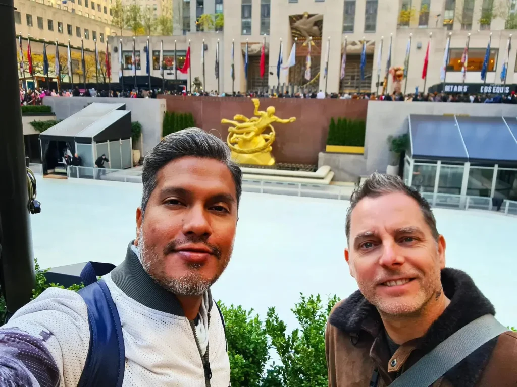 Cruising with Danny and Peter, Holland America Line, Rotterdam, New York, United States | View of iconic New York City landmarks including the Top of the Rock, Saint Patrick's Cathedral, MoMA, and the Flatiron Building, showcasing famous NYC art museums and historic monuments.