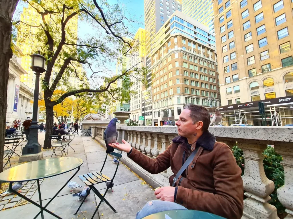 Cruising with Danny and Peter, Holland America Line, Rotterdam, New York, United States | View of iconic New York City landmarks including the Top of the Rock, Saint Patrick's Cathedral, MoMA, and the Flatiron Building, showcasing famous NYC art museums and historic monuments.