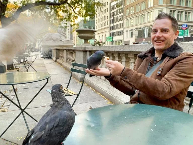 Cruising with Danny and Peter, Holland America Line, Rotterdam, New York, United States | View of iconic New York City landmarks including the Top of the Rock, Saint Patrick's Cathedral, MoMA, and the Flatiron Building, showcasing famous NYC art museums and historic monuments.