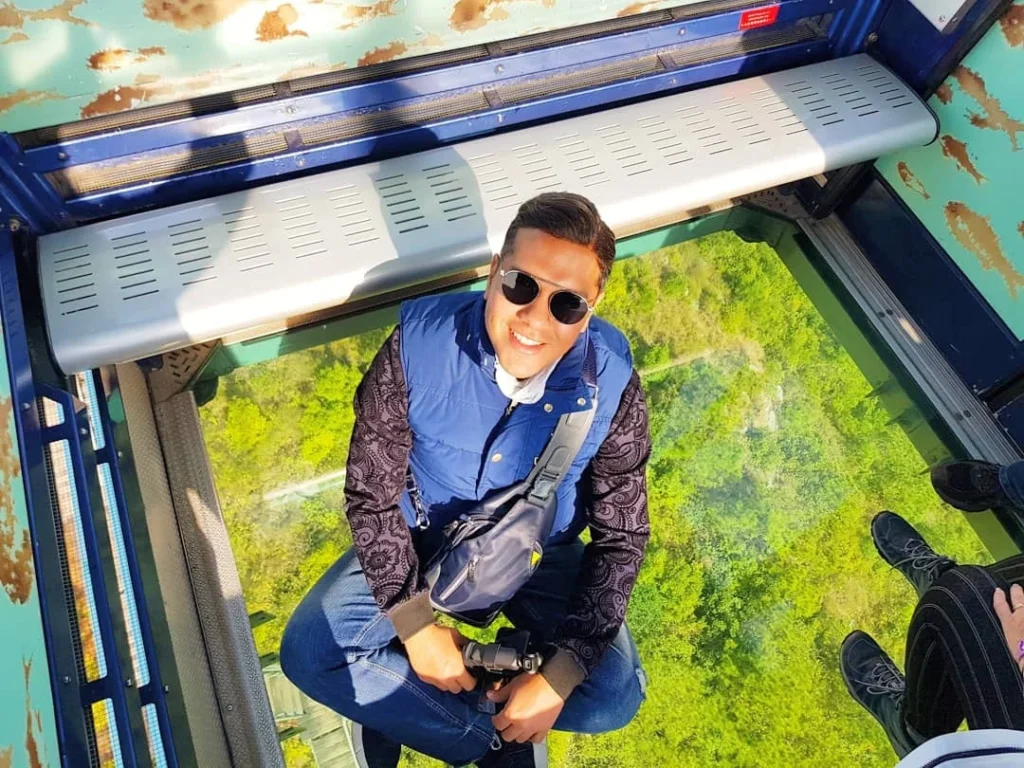 Cruising with Danny and Peter, Holland America Line, Westerdam, Hong Kong, China | A breathtaking view from Ngong Ping 360 cable car showcasing lush landscapes and the South China Sea, capturing the serene beauty of Lantau Island. A majestic shot of the Tian Tan Buddha, surrounded by the tranquil Po Lin Monastery, illustrating the cultural richness of Hong Kong. The vibrant skyline of Hong Kong from Victoria Peak, highlighting the dynamic cityscape during sunset, with twinkling lights illuminating the urban landscape, representing the perfect blend of nature and urbanity in these unforgettable Hong Kong Adventures.