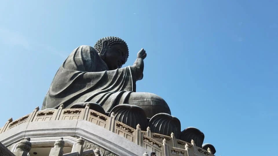Cruising with Danny and Peter, Holland America Line, Westerdam, Hong Kong, China | A breathtaking view from Ngong Ping 360 cable car showcasing lush landscapes and the South China Sea, capturing the serene beauty of Lantau Island. A majestic shot of the Tian Tan Buddha, surrounded by the tranquil Po Lin Monastery, illustrating the cultural richness of Hong Kong. The vibrant skyline of Hong Kong from Victoria Peak, highlighting the dynamic cityscape during sunset, with twinkling lights illuminating the urban landscape, representing the perfect blend of nature and urbanity in these unforgettable Hong Kong Adventures.