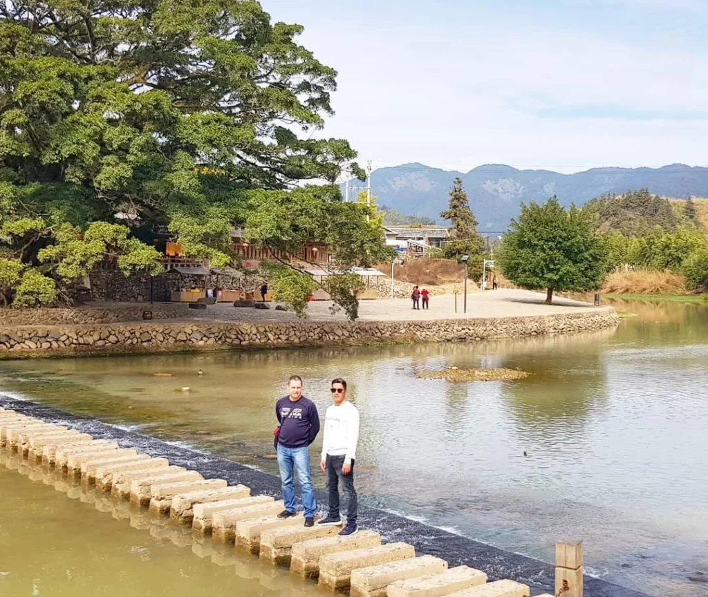 Xiamen Cruise Port: Our Complete Guide + Insider Tips 2026 (Visited Once in 2019 by Danny and Peter) 5 Cruising with Danny and Peter, Holland America Line, Westerdam, Xiamen, China | Exterior and interior views of Fujian Tulou, featuring traditional Hakka earthen architecture and intricate wooden carvings. Showcasing scenic Fujian Province landscapes and communal living structures at the UNESCO World Heritage site in Xiamen.