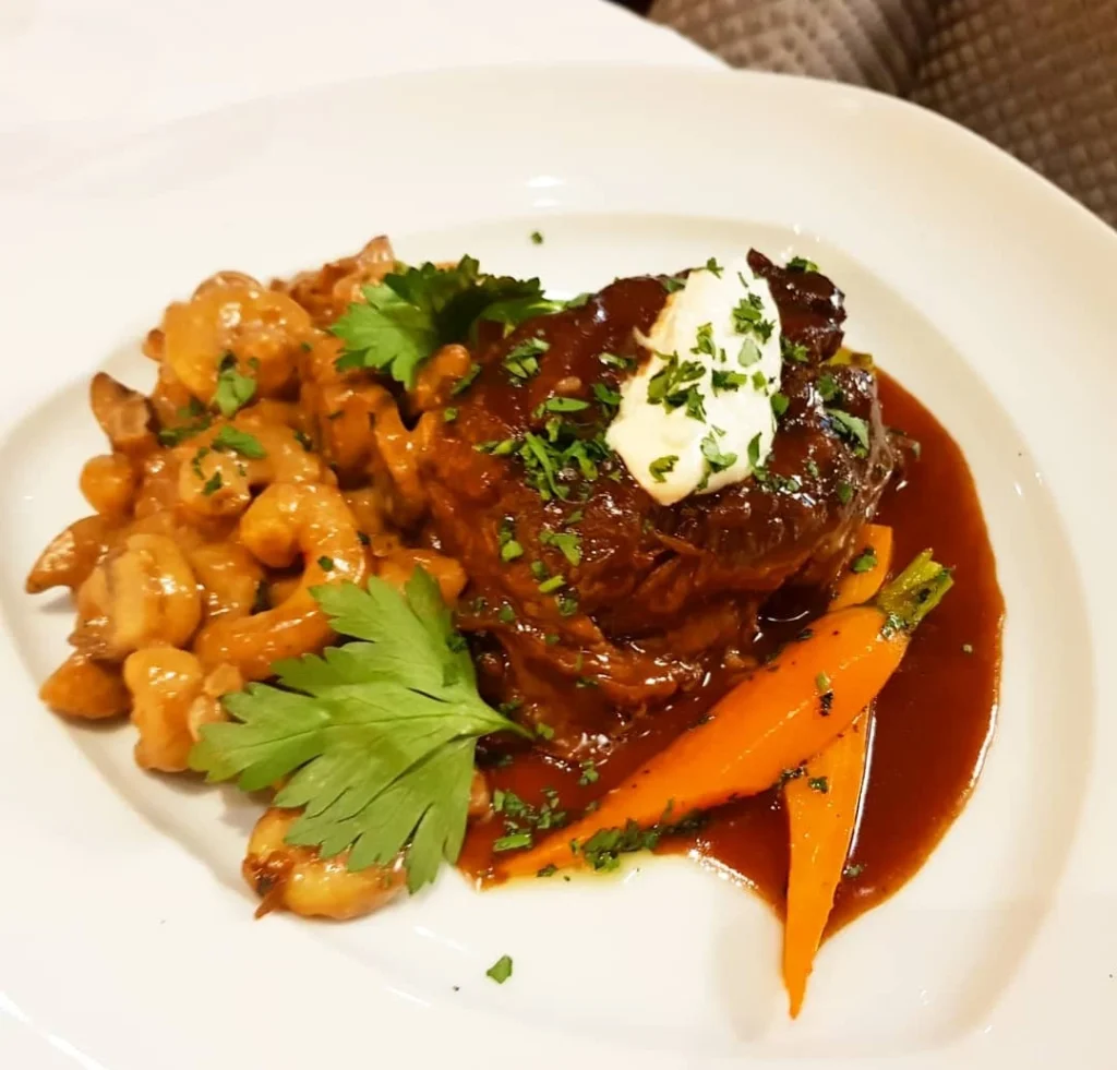 Xiamen Cruise Port: Our Complete Guide + Insider Tips 2026 (Visited Once in 2019 by Danny and Peter) 25 Cruising with Danny and Peter, Holland America Line, Westerdam, Xiamen, China | Exterior and interior views of Fujian Tulou, featuring traditional Hakka earthen architecture and intricate wooden carvings. Showcasing scenic Fujian Province landscapes and communal living structures at the UNESCO World Heritage site in Xiamen.