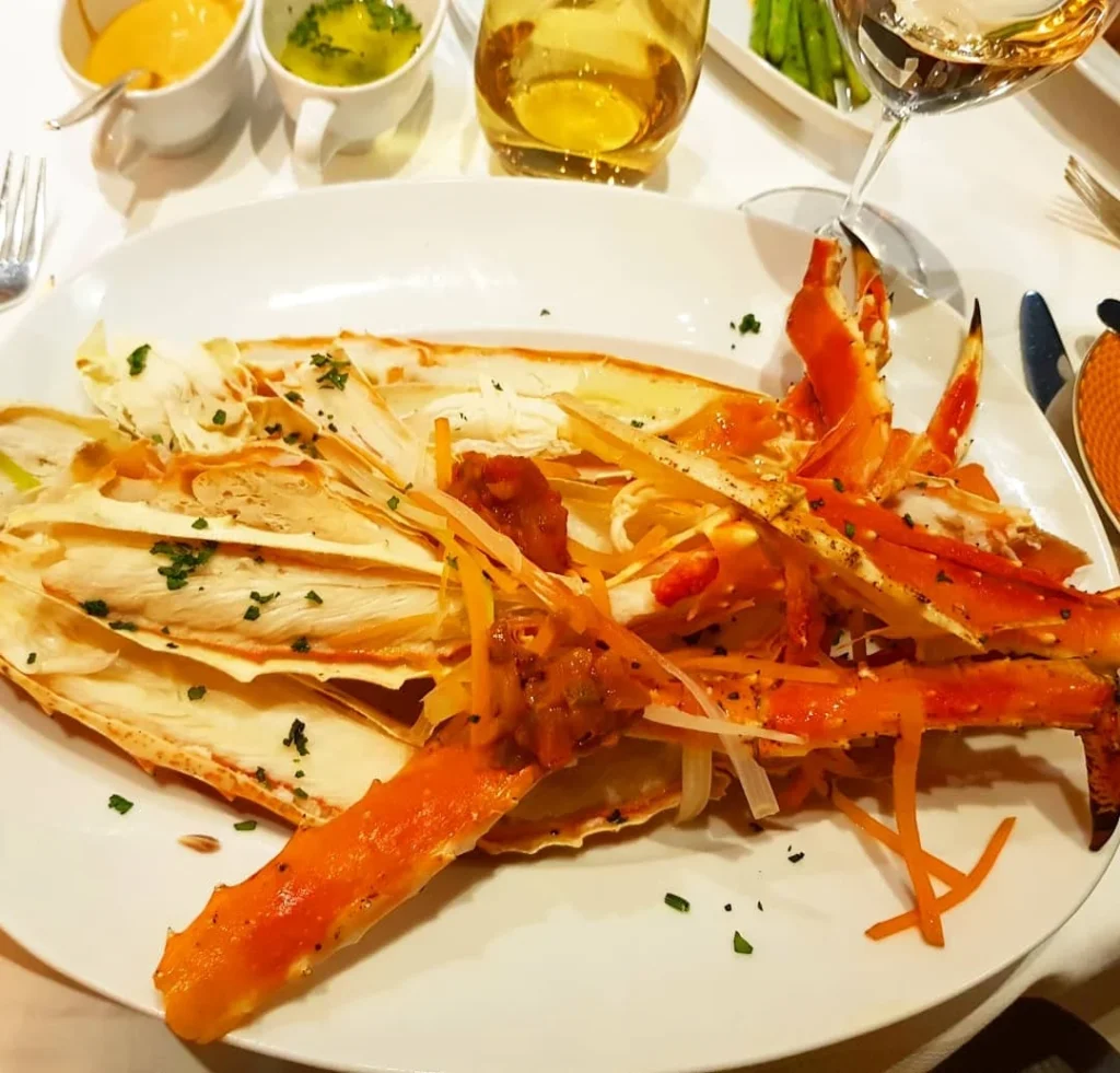 Xiamen Cruise Port: Our Complete Guide + Insider Tips 2026 (Visited Once in 2019 by Danny and Peter) 26 Cruising with Danny and Peter, Holland America Line, Westerdam, Xiamen, China | Exterior and interior views of Fujian Tulou, featuring traditional Hakka earthen architecture and intricate wooden carvings. Showcasing scenic Fujian Province landscapes and communal living structures at the UNESCO World Heritage site in Xiamen.