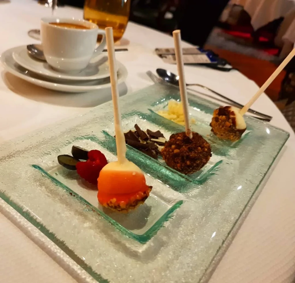 Xiamen Cruise Port: Our Complete Guide + Insider Tips 2026 (Visited Once in 2019 by Danny and Peter) 27 Cruising with Danny and Peter, Holland America Line, Westerdam, Xiamen, China | Exterior and interior views of Fujian Tulou, featuring traditional Hakka earthen architecture and intricate wooden carvings. Showcasing scenic Fujian Province landscapes and communal living structures at the UNESCO World Heritage site in Xiamen.