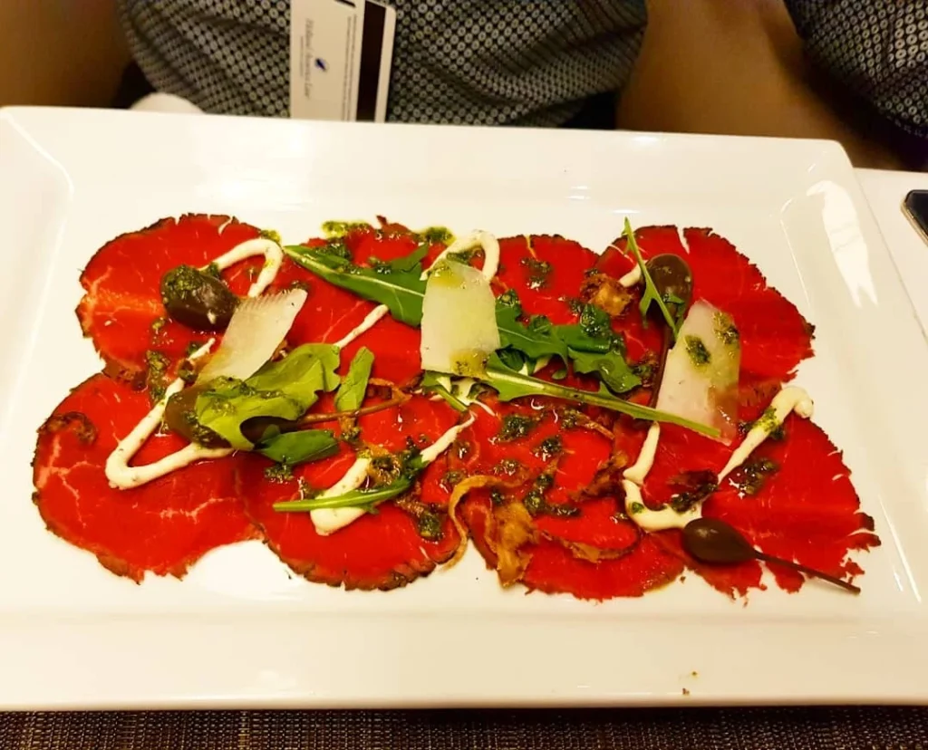 Xiamen Cruise Port: Our Complete Guide + Insider Tips 2026 (Visited Once in 2019 by Danny and Peter) 30 Cruising with Danny and Peter, Holland America Line, Westerdam, Xiamen, China | Exterior and interior views of Fujian Tulou, featuring traditional Hakka earthen architecture and intricate wooden carvings. Showcasing scenic Fujian Province landscapes and communal living structures at the UNESCO World Heritage site in Xiamen.