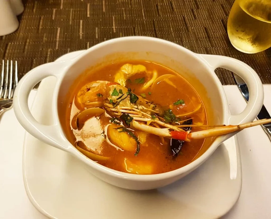 Xiamen Cruise Port: Our Complete Guide + Insider Tips 2026 (Visited Once in 2019 by Danny and Peter) 31 Cruising with Danny and Peter, Holland America Line, Westerdam, Xiamen, China | Exterior and interior views of Fujian Tulou, featuring traditional Hakka earthen architecture and intricate wooden carvings. Showcasing scenic Fujian Province landscapes and communal living structures at the UNESCO World Heritage site in Xiamen.