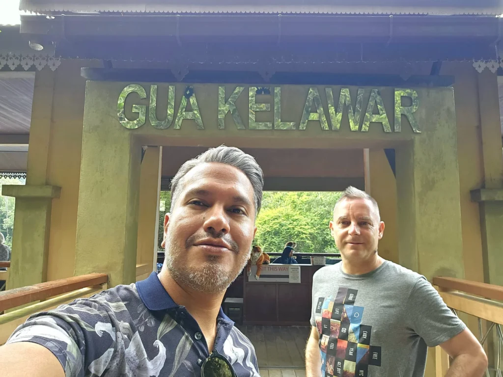 Cruising with Danny and Peter, Holland America Line, Westerdam, Porto Malai, Langkawi, Malaysia | Scenic views of Porto Malai Marina with yachts, private boat cruising through Kilim Karst Geoforest's mangroves, majestic eagles soaring above, and panoramic vistas from the Langkawi Sky Bridge and Cable Car overlooking lush rainforests and the Andaman Sea during a Langkawi Day Trip.