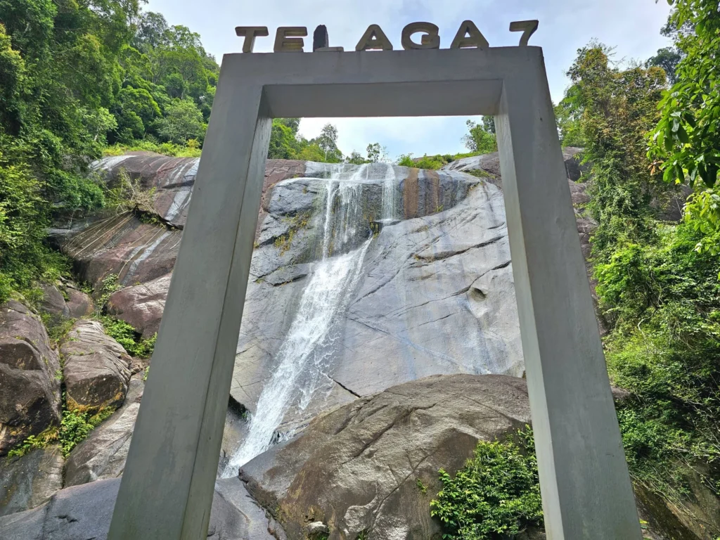 Cruising with Danny and Peter, Holland America Line, Westerdam, Porto Malai, Langkawi, Malaysia | Scenic views of Porto Malai Marina with yachts, private boat cruising through Kilim Karst Geoforest's mangroves, majestic eagles soaring above, and panoramic vistas from the Langkawi Sky Bridge and Cable Car overlooking lush rainforests and the Andaman Sea during a Langkawi Day Trip.