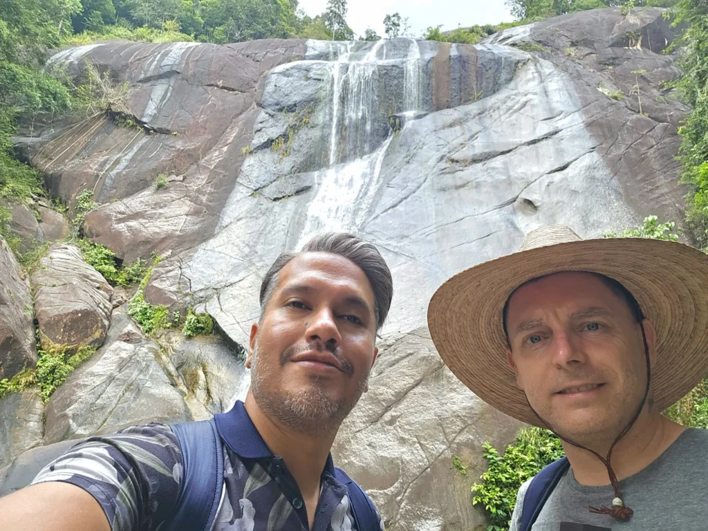 Cruising with Danny and Peter, Holland America Line, Westerdam, Porto Malai, Langkawi, Malaysia | Scenic views of Porto Malai Marina with yachts, private boat cruising through Kilim Karst Geoforest's mangroves, majestic eagles soaring above, and panoramic vistas from the Langkawi Sky Bridge and Cable Car overlooking lush rainforests and the Andaman Sea during a Langkawi Day Trip.