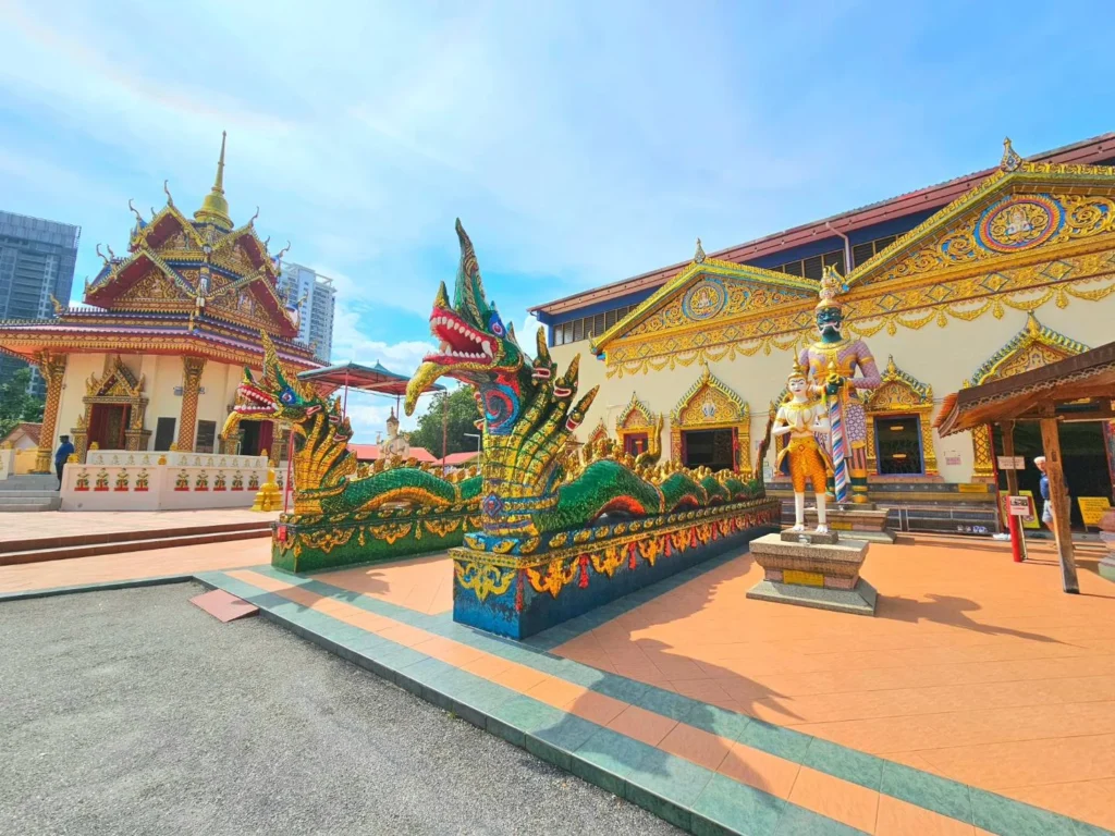 Cruising with Danny and Peter, Holland America Line, Westerdam, Penang, Malaysia | Explore Penang’s cultural treasures with the Kek Lok Si Temple’s intricate pagoda, Wat Chaiya Mangkalaram’s colossal reclining Buddha, Dhammikarama Burmese Temple’s golden structures, the ornate interior of Pinang Peranakan Mansion, the lush greenery of Penang Botanical Gardens, and the breathtaking panoramic views from Penang Hill.