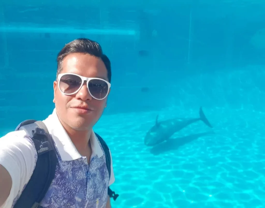 Cruising with Danny and Peter, Holland America Line, Westerdam, Naha, Japan | Explore the vibrant marine life at Naha Aquarium Okinawa, featuring stunning exhibits like the Kuroshio Sea tank with whale sharks, the engaging Dolphin Lagoon, and colorful coral reef ecosystems, showcasing the rich biodiversity and commitment to Okinawa marine conservation.