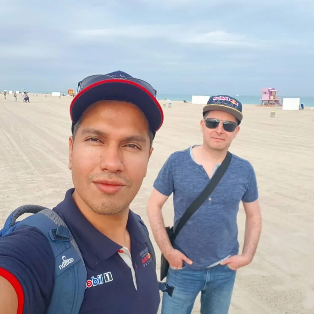 Cruising with Danny and Peter, Holland America Line, Zuiderdam, Miami, United States | Scenic Miami Beach bike ride along Ocean Drive, featuring cyclists on the South Beach bike path with views of Art Deco buildings, the boardwalk, and North Beach.