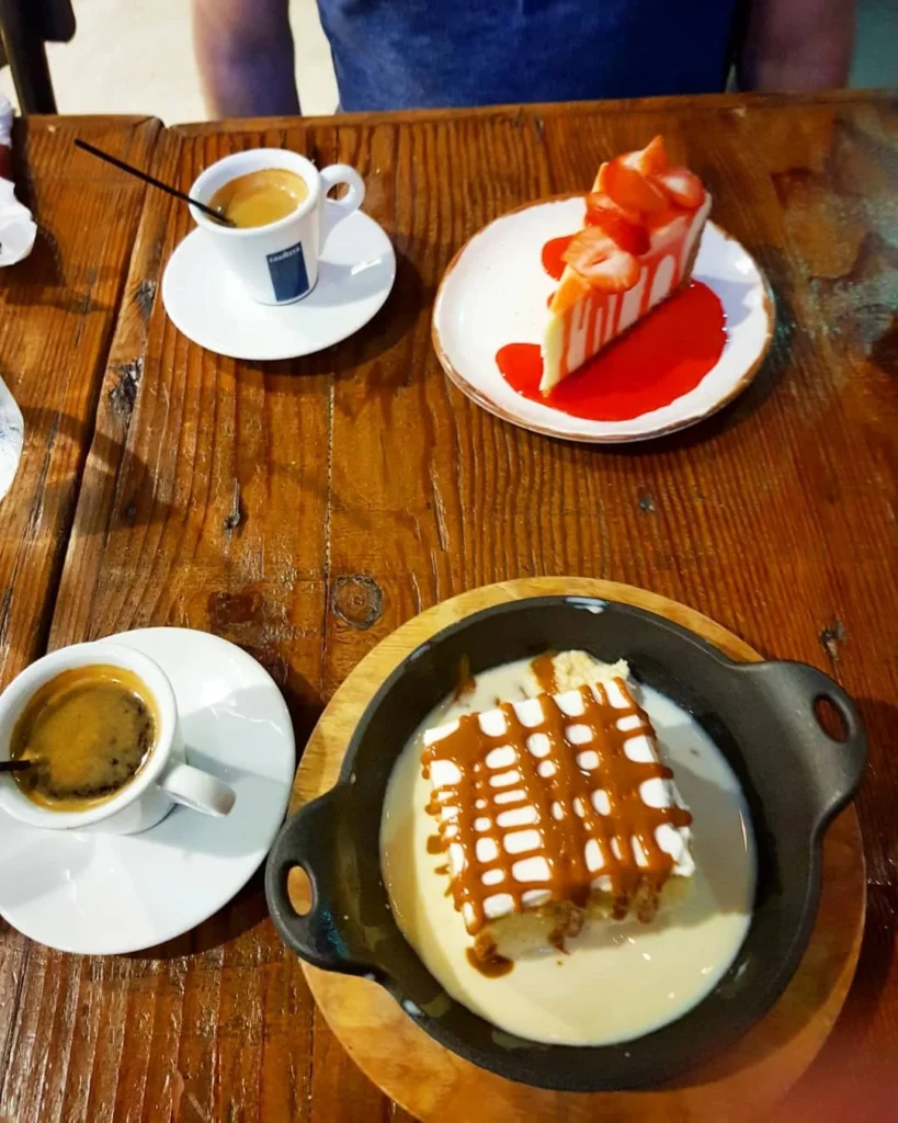 Cruising with Danny and Peter, Holland America Line, Zuiderdam, Miami, United States | Scenic Miami Beach bike ride along Ocean Drive, featuring cyclists on the South Beach bike path with views of Art Deco buildings, the boardwalk, and North Beach.