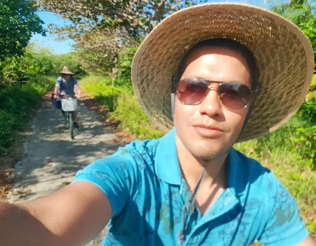 Cruising with Danny and Peter, Holland America Line, Westerdam, Ishigaki Island, Japan | Scenic views of Ishigaki Island cycling adventures showcasing vibrant beaches, lush landscapes, and cyclists enjoying the coastal routes, highlighting the beauty of Okinawa Island cycling experiences and tropical cycling destinations.