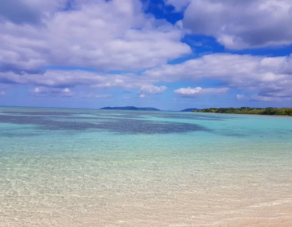 Cruising with Danny and Peter, Holland America Line, Westerdam, Ishigaki Island, Japan | Scenic views of Ishigaki Island cycling adventures showcasing vibrant beaches, lush landscapes, and cyclists enjoying the coastal routes, highlighting the beauty of Okinawa Island cycling experiences and tropical cycling destinations.