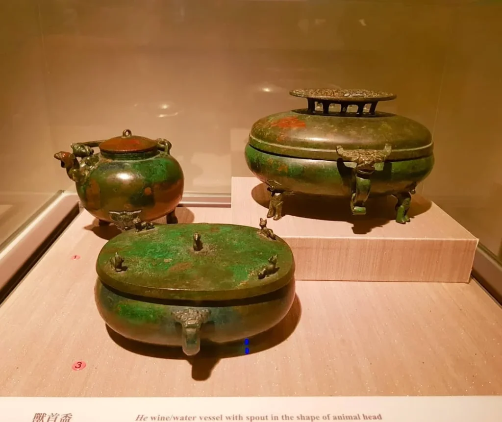 Keelung Taipei Cruise Port: Our Complete Guide + Insider Tips 2026 (Visited Once in 2019 by Danny and Peter) 6 Cruising with Danny and Peter, Holland America Line, Westerdam, Keelung, Taipei, Taiwan | Vibrant scene of Keelung Night Market showcasing diverse Taiwanese street food, including oyster pancakes and stinky tofu, with colorful stalls and lively crowds. Scenic views from Chaojing Park overlooking Keelung Harbor, featuring traditional architecture and lush landscapes. Picturesque images of Keelung Island attractions, highlighting pristine beaches and charming fishing villages, capturing the cultural heritage of Keelung and its rich maritime history.