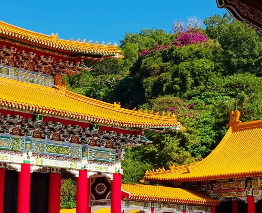 Keelung Taipei Cruise Port: Our Complete Guide + Insider Tips 2026 (Visited Once in 2019 by Danny and Peter) 14 Cruising with Danny and Peter, Holland America Line, Westerdam, Keelung, Taipei, Taiwan | Vibrant scene of Keelung Night Market showcasing diverse Taiwanese street food, including oyster pancakes and stinky tofu, with colorful stalls and lively crowds. Scenic views from Chaojing Park overlooking Keelung Harbor, featuring traditional architecture and lush landscapes. Picturesque images of Keelung Island attractions, highlighting pristine beaches and charming fishing villages, capturing the cultural heritage of Keelung and its rich maritime history.